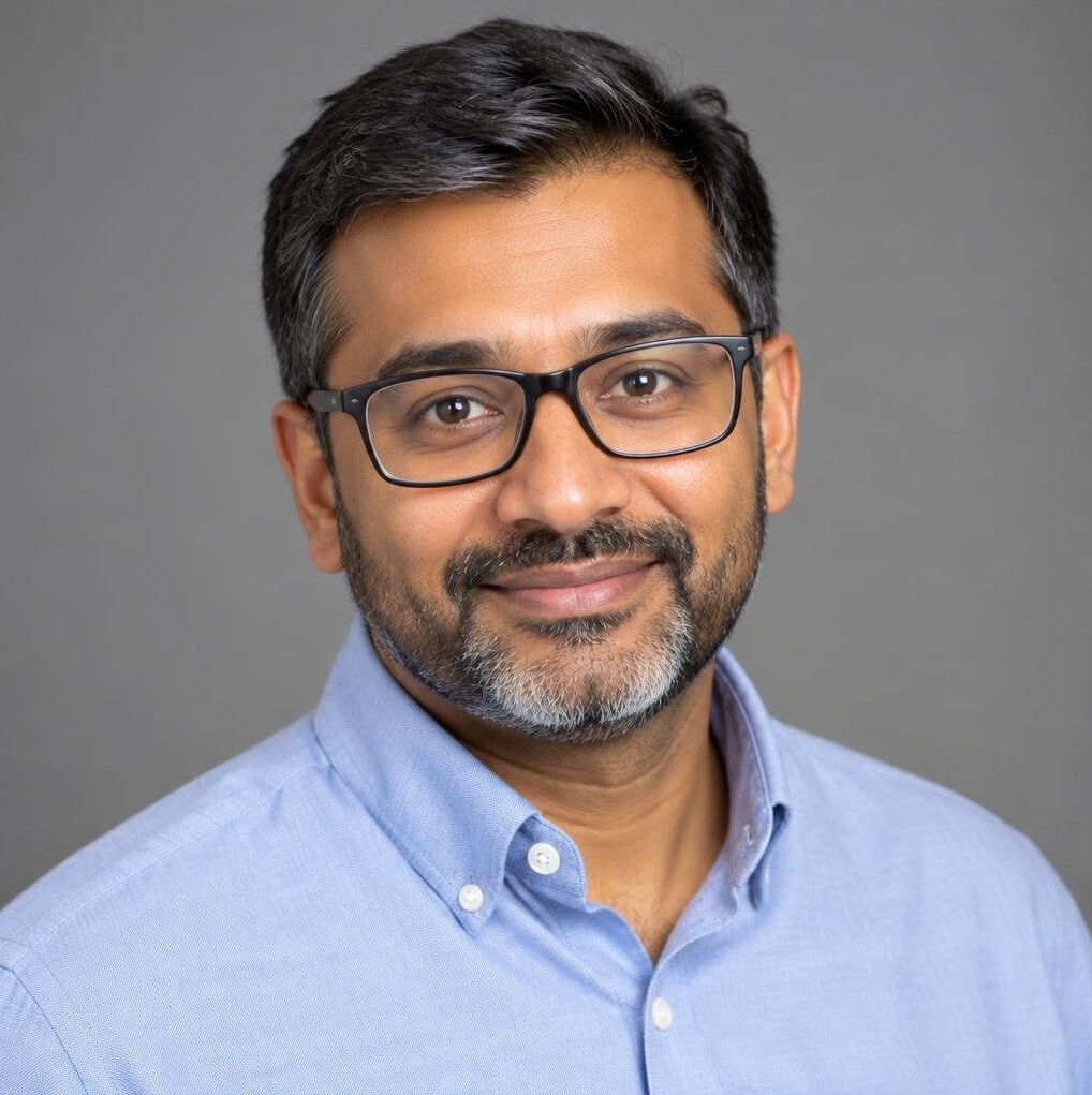 Portrait of a South Asian British male vision mixer trainer