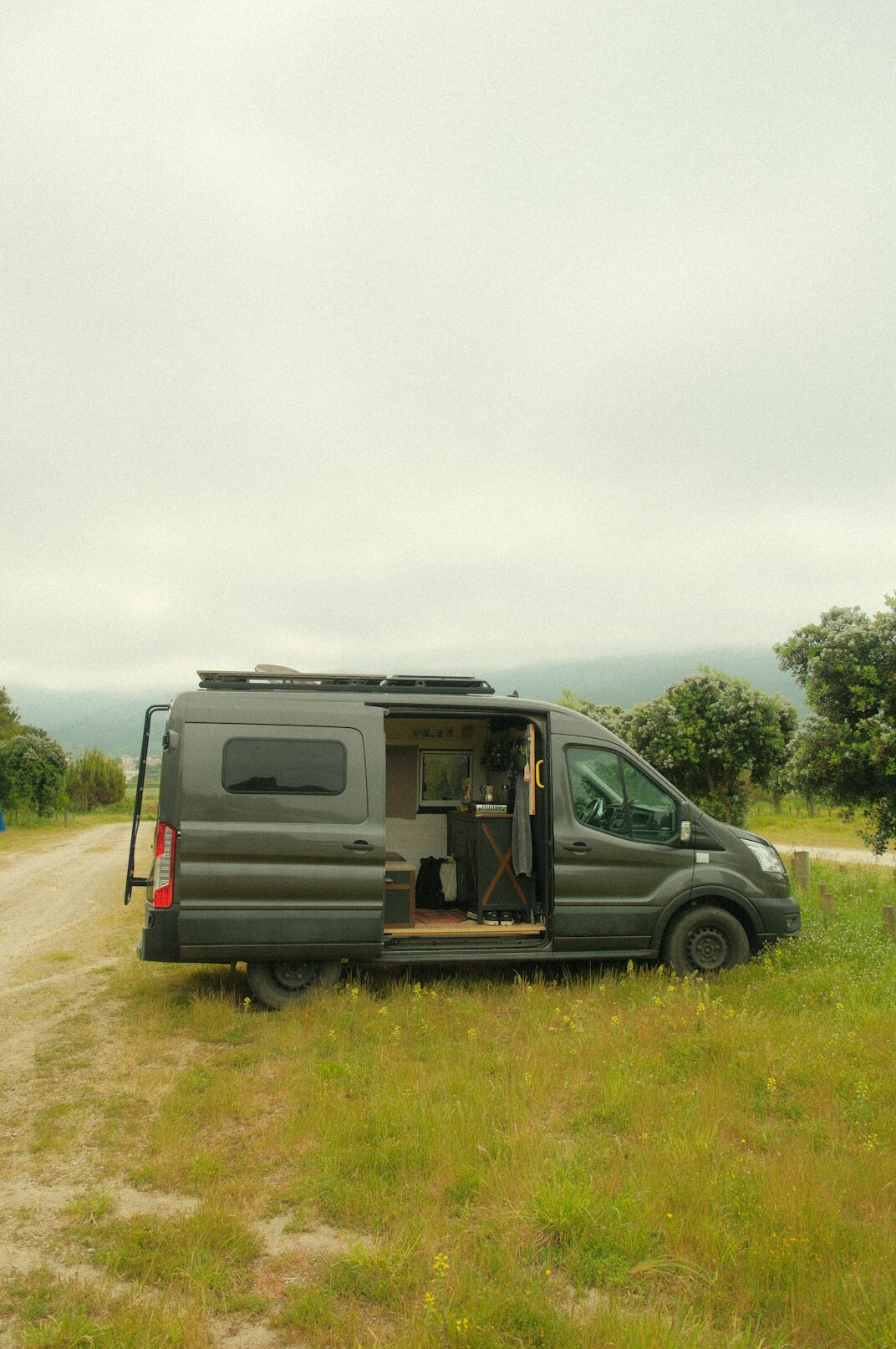 Outside broadcast van with cables and satellite equipment